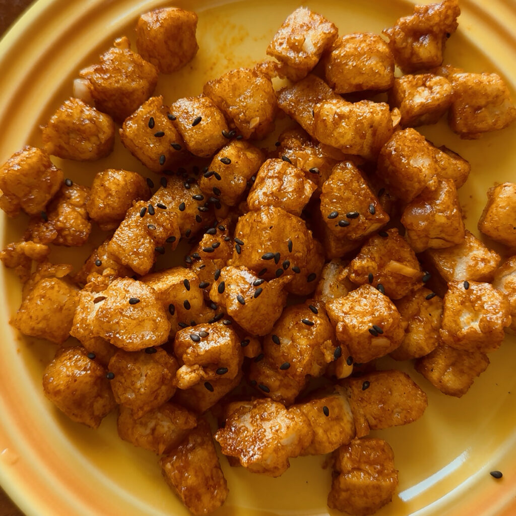 Finished crispy Korean tofu with sweet and spicy sauce