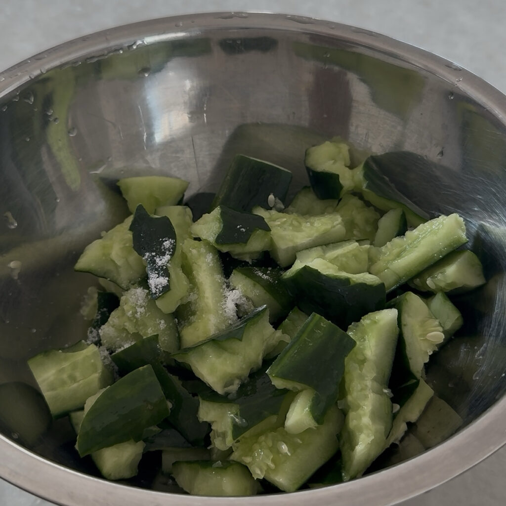 Smashed Cucumber Salad Salting cucumbers to draw out excess water for Korean smashed cucumber salad