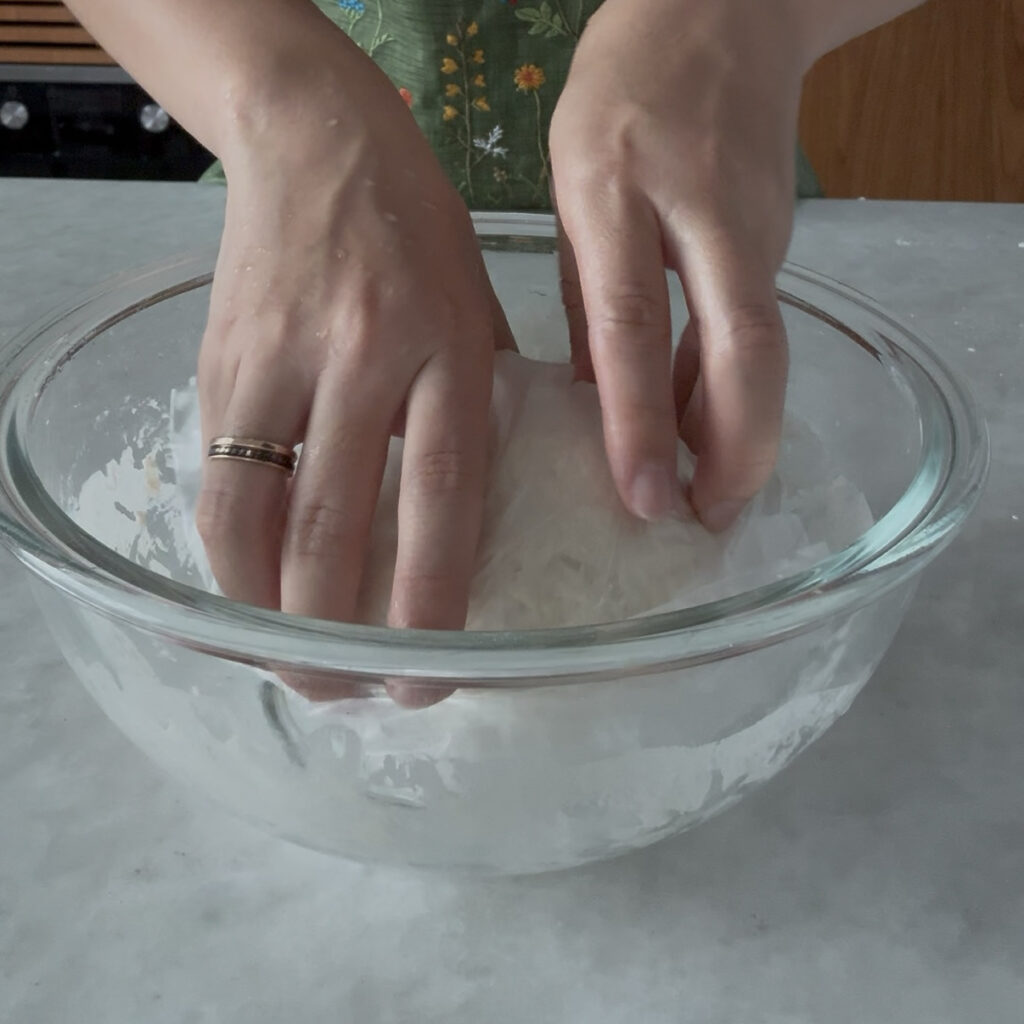 Sujebi Korean sujebi dough wrapped in plastic wrap for resting