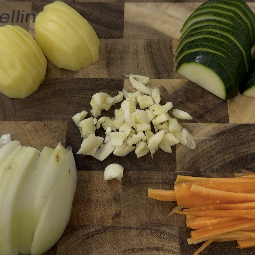 Sujebi Chopped vegetables for Korean sujebi including zucchini, onion, and carrot