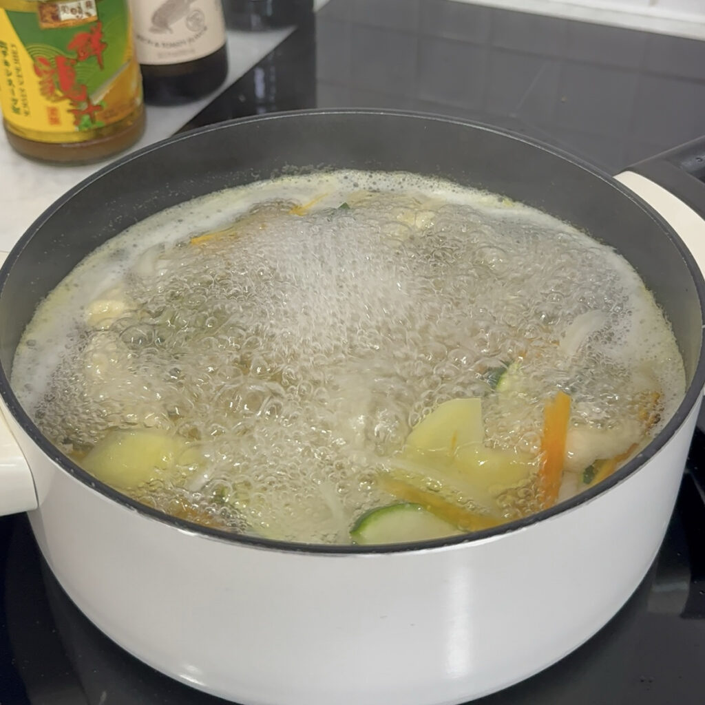 Sujebi Korean sujebi soup boiling in a pot