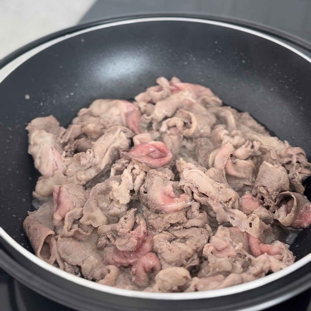 Partially cooked beef brisket