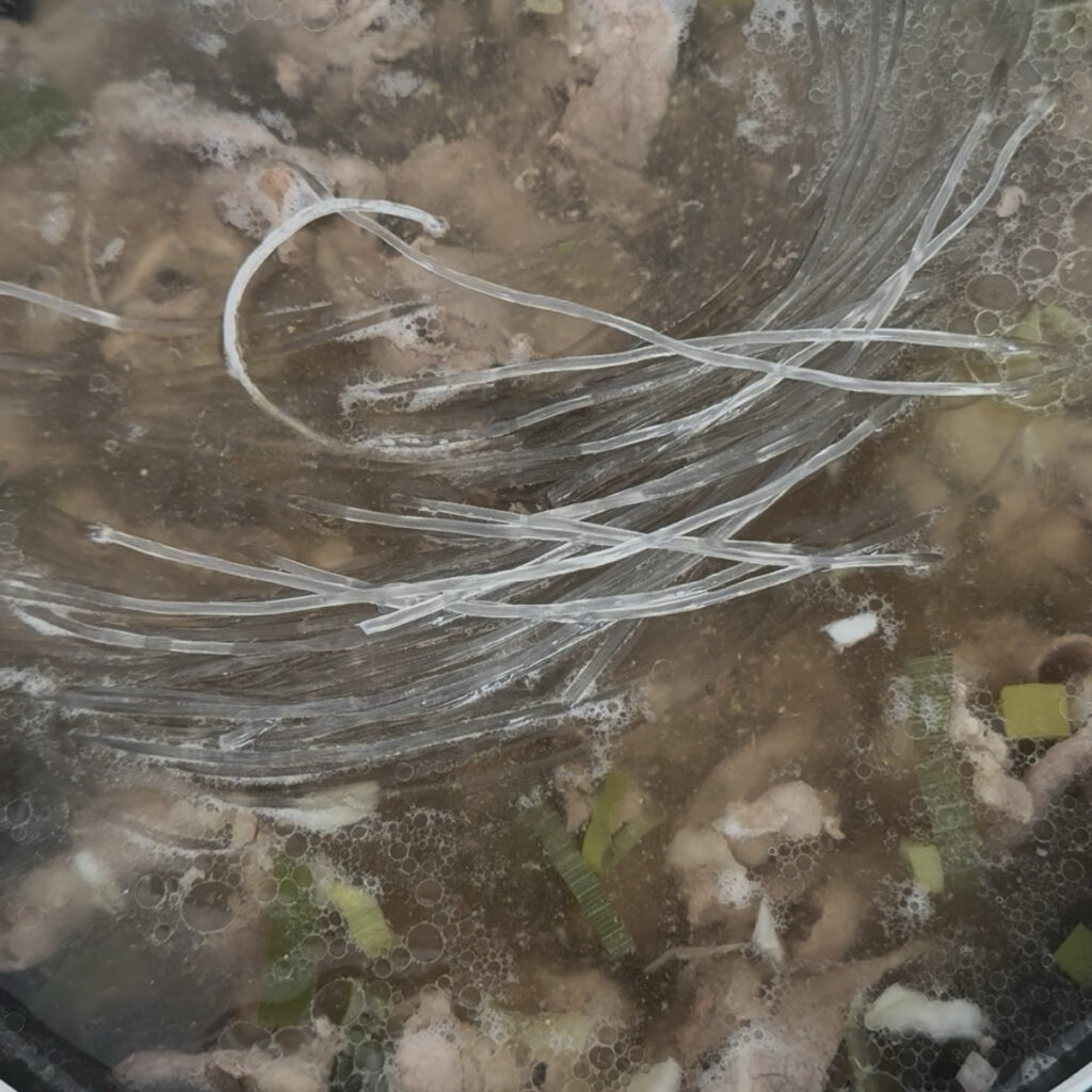 Adding soaked glass noodles