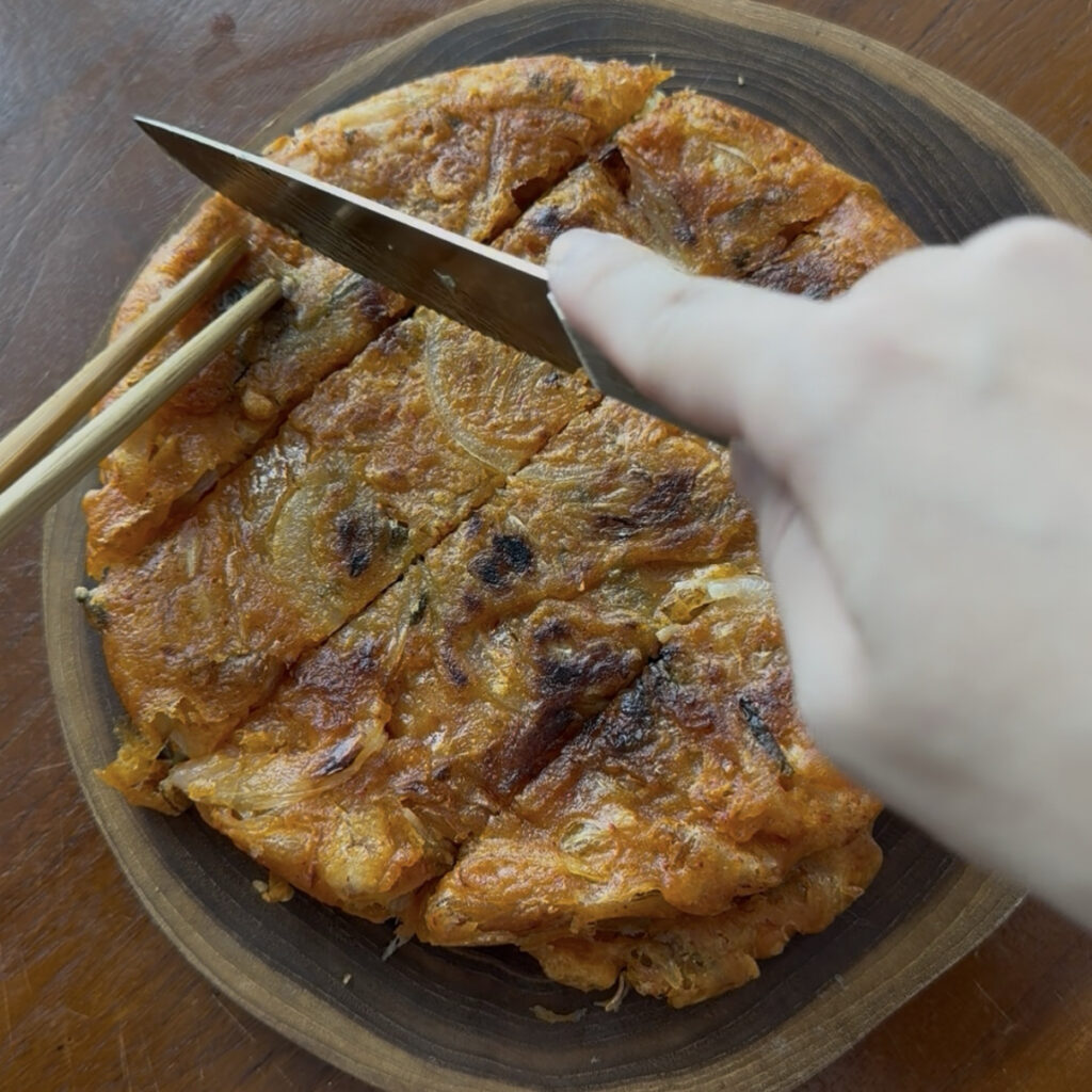 Crispy kimchi pancakes sliced and ready to serve