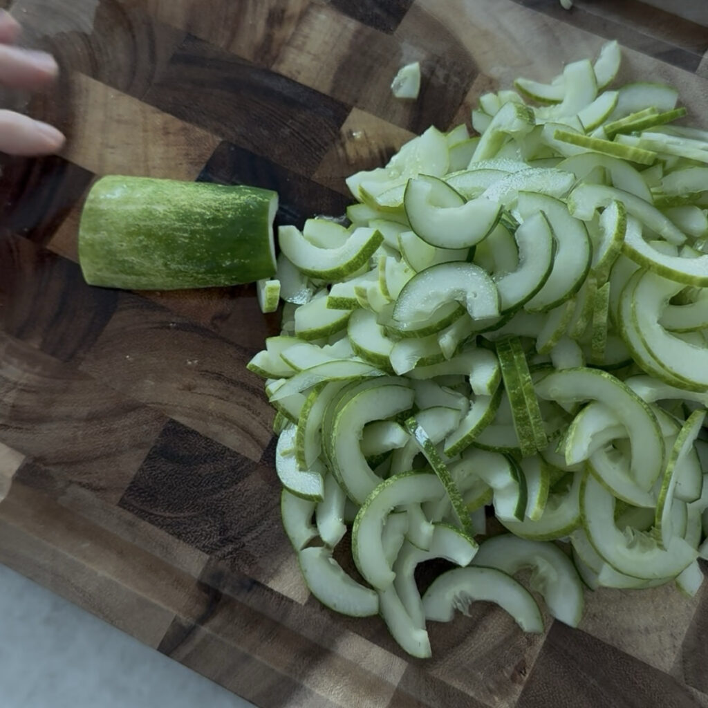 Thinly slicing cucumbers for Korean cucumber salad