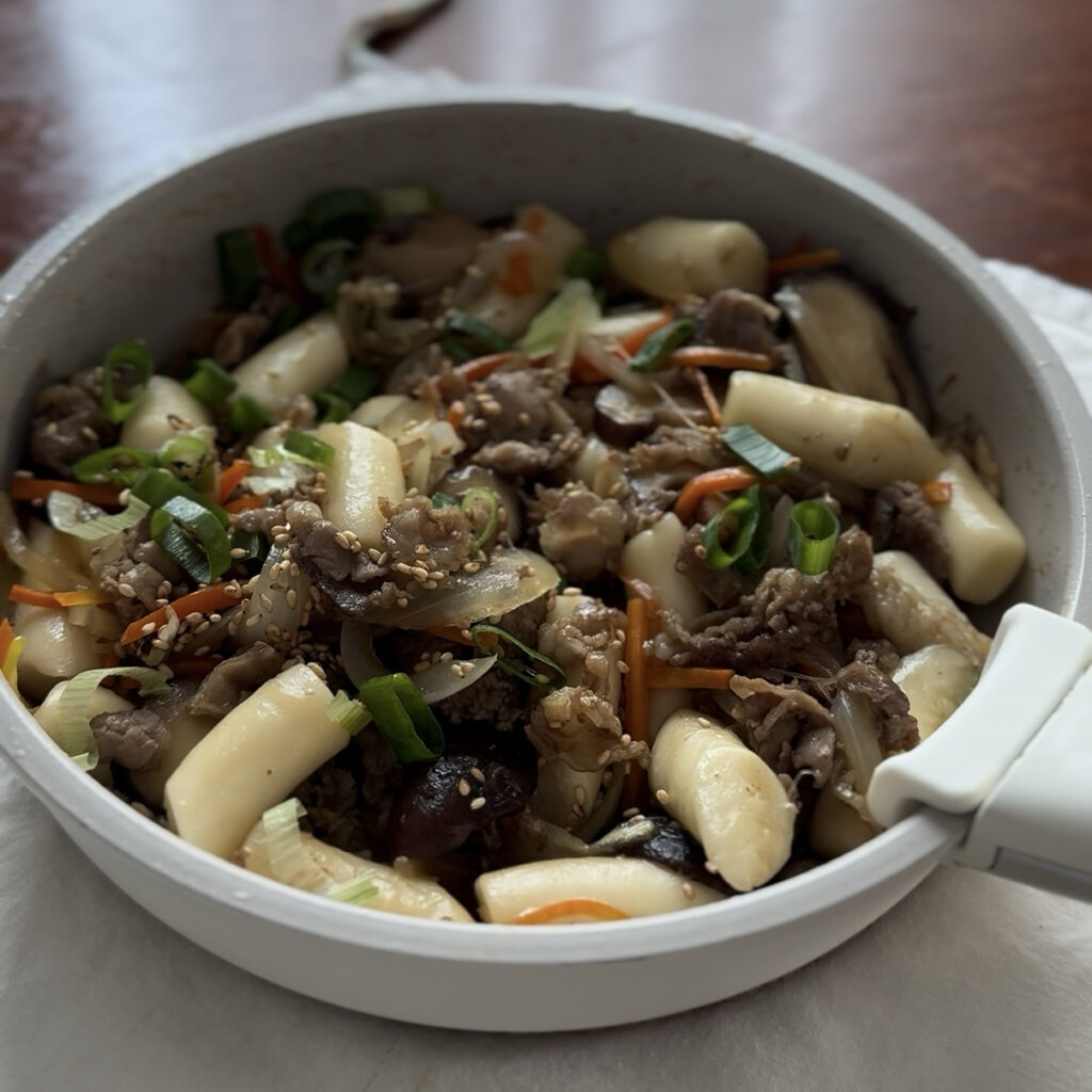 Easy Gungjung Tteokbokki served in a bowl with beef and vegetables