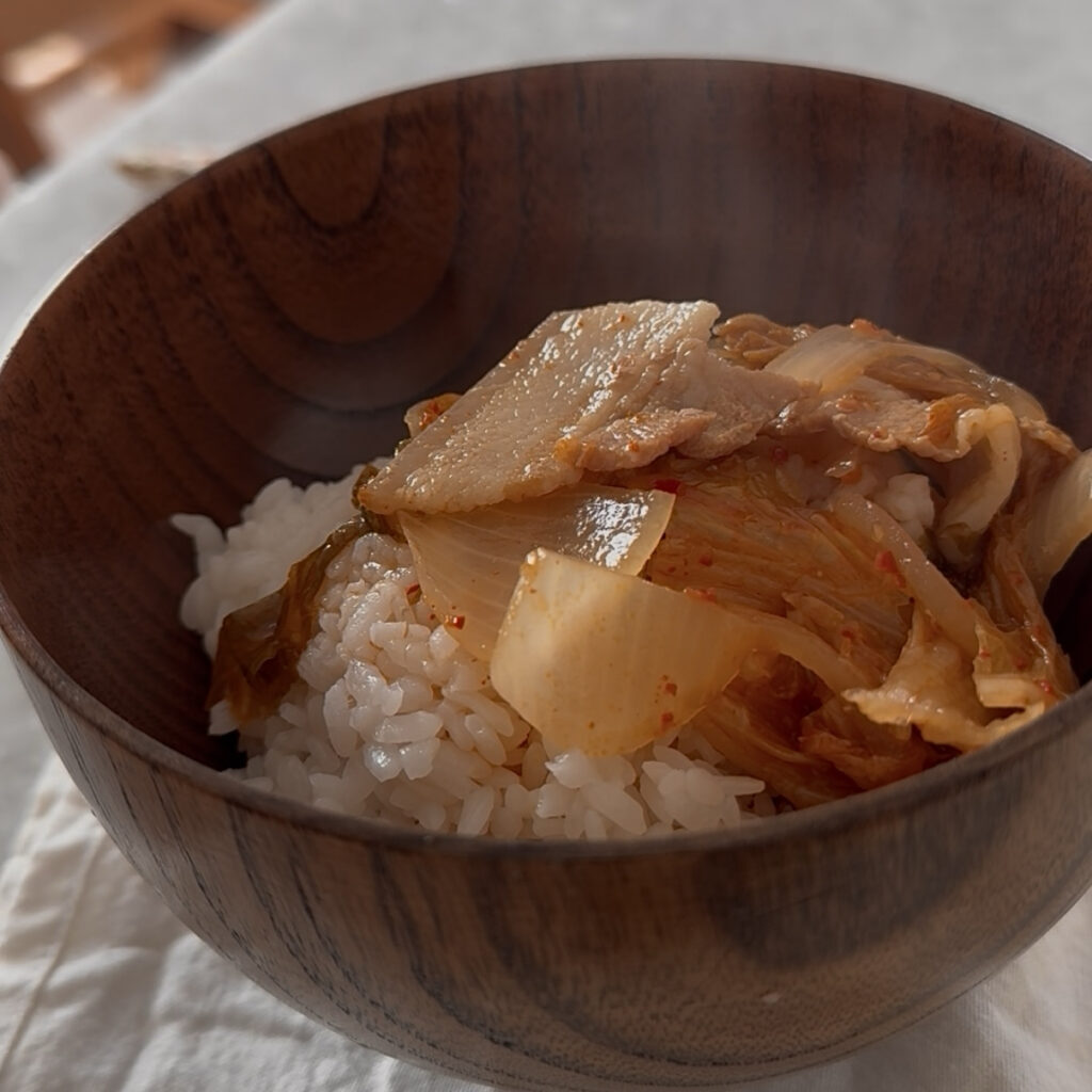 Kimchi Jjigae served hot with steamed white rice