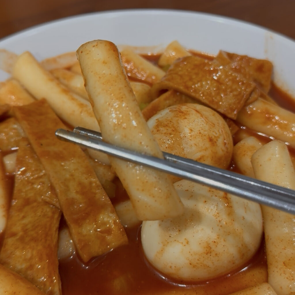 Homemade tteokbokki made with Korean rice cakes and fish cakes