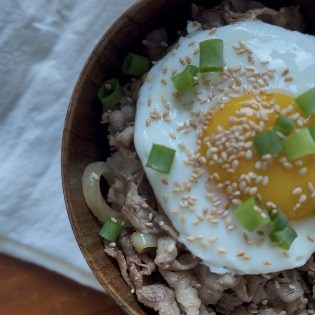 Easy homemade woosamgyeop rice bowl served with a fried egg