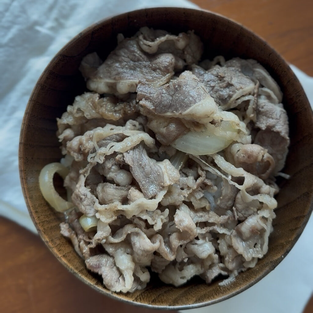 Woosamgyeop beef belly and onions over steamed rice