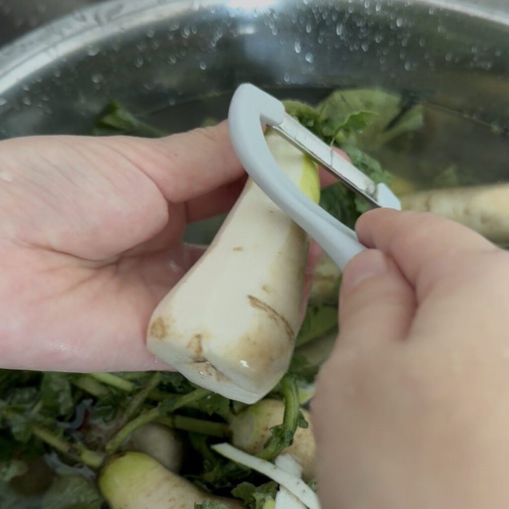 Peeling young radishes