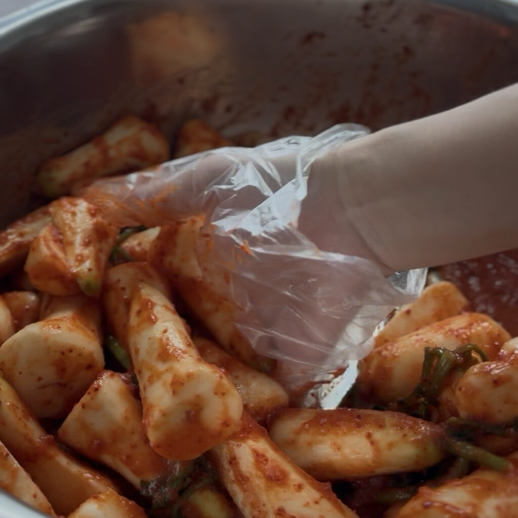 Mixing the seasoning for Korean chonggak kimchi