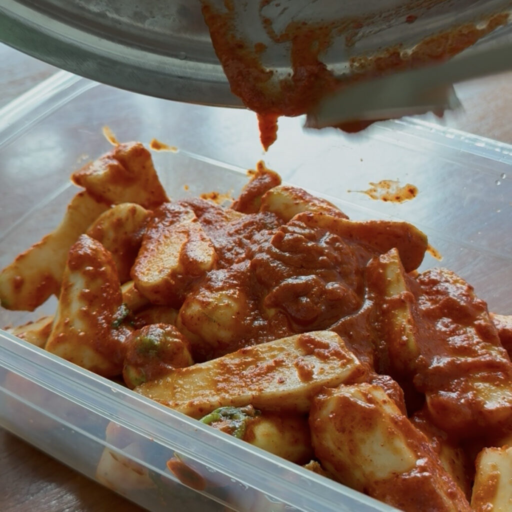 Freshly made chonggak kimchi ready to ferment