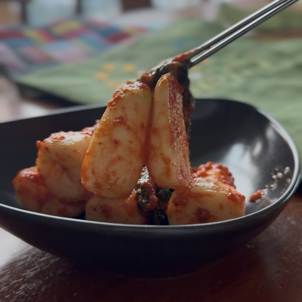 Homemade Korean chonggak kimchi with crunchy young radishes
