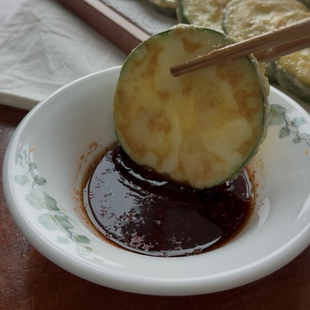 Korean zucchini pancakes served with soy dipping sauce