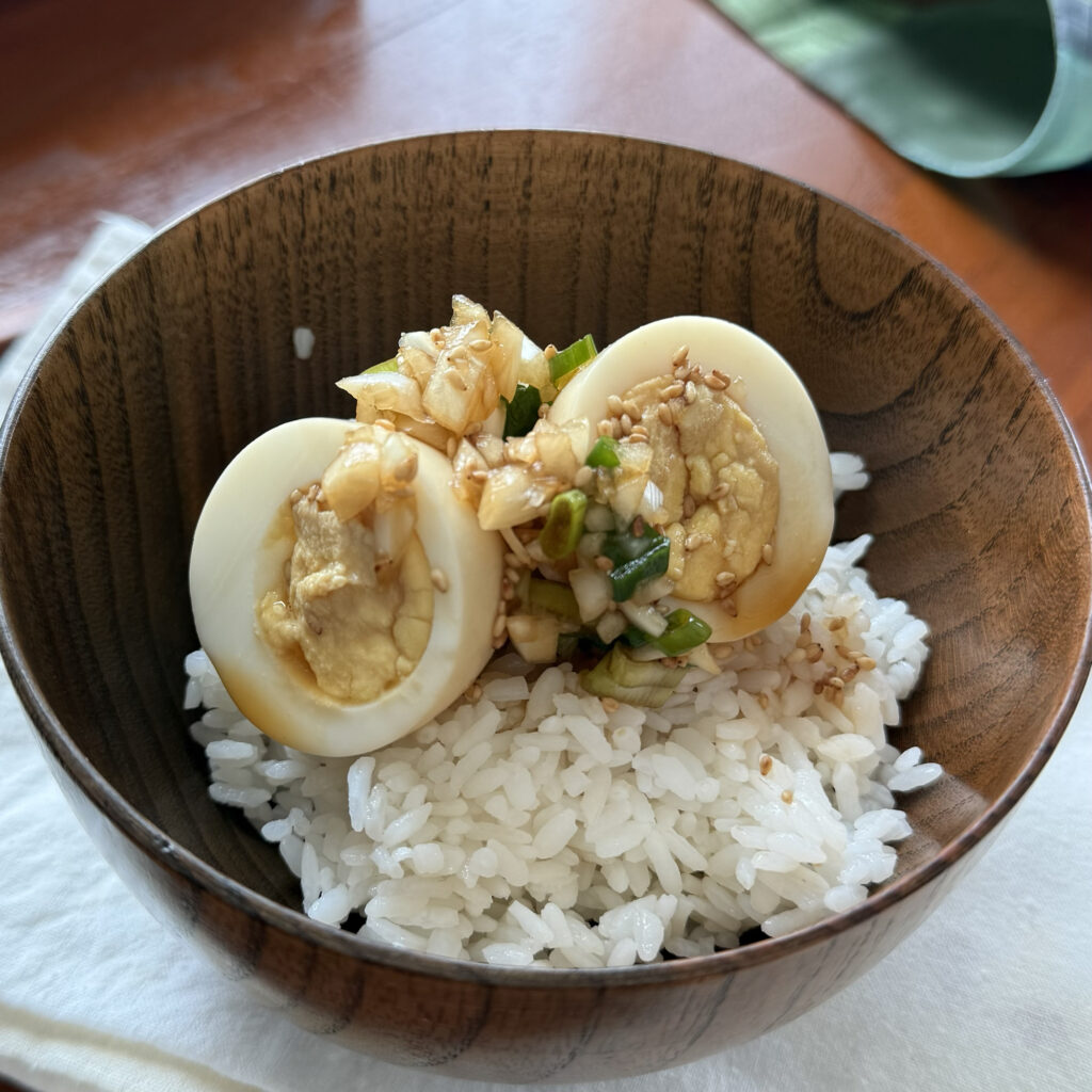 Homemade Korean soy-marinated eggs served with warm rice