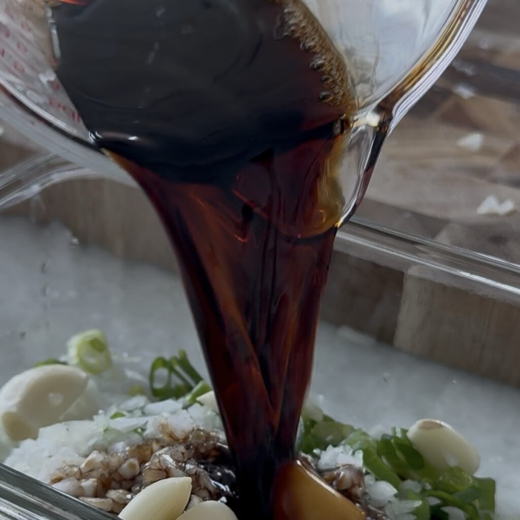 Soy sauce, water, and sugar mixed for the egg marinade