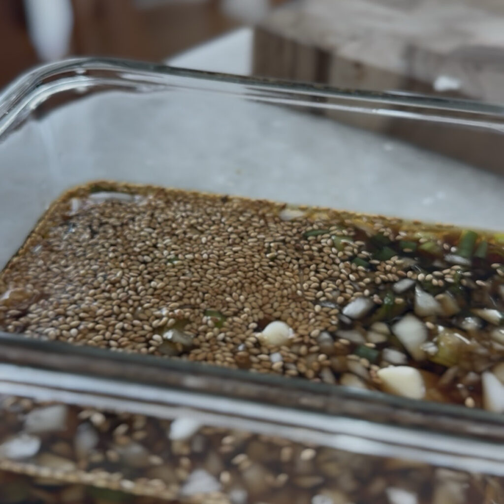 Fresh vegetables and sesame seeds added to the soy marinade 